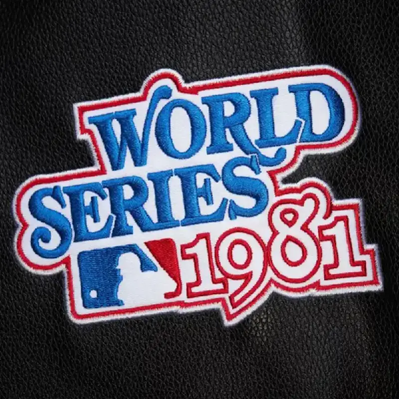 Men’s Los Angeles Dodgers Black Out Collection Vintage Logo Varsity Jacket